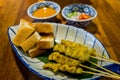 Pork satay,toast and dip sauce, very dilicious. Royalty Free Stock Photo