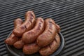 Pork sausage and hot dogs on the grill Royalty Free Stock Photo