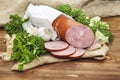 Pork sausage sliced in small pieces in a white packing Royalty Free Stock Photo