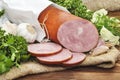 Pork sausage sliced in small pieces in a white packing Royalty Free Stock Photo