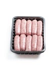 Pork sausages in plastic pack isolated on white Royalty Free Stock Photo