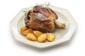 Pork shank with roasted potatoes, italian cuisine