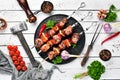 Pork shish kebab with onions and tomatoes. Barbecue. Top view. Royalty Free Stock Photo