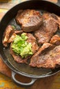 Pork shoulder in white wine with broad beans & herbs pesto