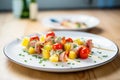 pork skewers with pineapple and cherry tomatoes on a plate Royalty Free Stock Photo