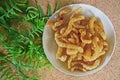 Pork snack dish with fresh green vegetable
