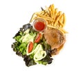 Pork steak in black pepper sauce with salad and french frie