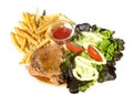 Pork steak in black pepper sauce with salad and french frie