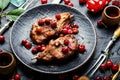 Meat pork in cherry sauce Royalty Free Stock Photo