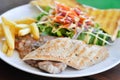 pork steak and chicken steak with French fries ,bread and salad or grilled pork and grilled chicken with fried potato Royalty Free Stock Photo