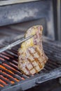 Pork steak cooked in a hosper barbecue party Royalty Free Stock Photo