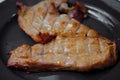 Pork steak grilled with salad and tomato Shallow depth of field Royalty Free Stock Photo