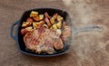 Pork steak potato in village white onion Royalty Free Stock Photo