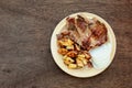 Pork steak potato in village white onion Royalty Free Stock Photo