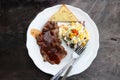 pork steak with sauce and salad vegetables with cream sauce and garlic bread grill in white round plate Royalty Free Stock Photo