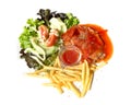 Pork steak in tomato sauce with salad and french frie