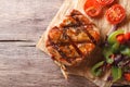 Pork steak with vegetables close-up horizontal top view, rustic