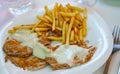 Pork steaks with fries Royalty Free Stock Photo