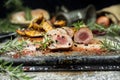 Pork tenderloin chops served with potatoes and rosemary Royalty Free Stock Photo