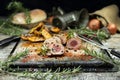 Pork tenderloin chops served with potatoes and rosemary Royalty Free Stock Photo