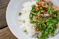 Pork and vegetable fried on hot rice