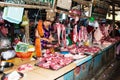 Pork vendor in traditional vietnam market