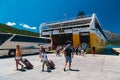 Poros, Cephalonia island, Greece - July, 17 2019: Disembarkation of cars, buses and passengers from ferry boat of