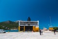 Poros, Cephalonia island, Greece - July, 17 2019: An embarkation of cars and passengers at a ferry boat of Levante Royalty Free Stock Photo