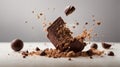 Porous chocolate is broken and flies on a white background. Isolated