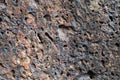 Porous volcanic rock wall, old stone background Royalty Free Stock Photo