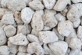 Porous white volcanic rock. Lava stone, pumice stone, or volcanic pumice with distinctive pores
