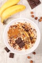 Porridge with cereal, banana and chocolate