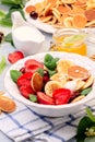 Porridge of tiny pancakes with berries. Trendy food