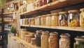 Porridges, cereals, kinds of pasta are stored in glass jars carefully placed on Eco-friendly store shelves. Successful business,