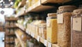 Porridges, cereals, kinds of pasta are stored in glass jars carefully placed on Eco-friendly store shelves. Successful business, Royalty Free Stock Photo