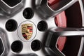 Porsche Alloy Wheel with badge and brake calliper