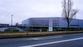 Porsche automobile dealership exterior.