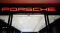 Porsche automobile dealership sign logo