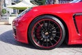 Porsche car front wheel in the 'Automotive Fair Albania'.