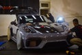 Porsche Cayman GT4 RS 718 in detailing shop