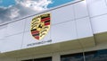 Porsche logo on the modern building facade. Editorial 3D rendering
