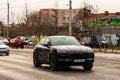 Porsche luxury car in traffic in Bucharest, Romania, 2022