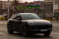 Porsche luxury car in traffic in Bucharest, Romania, 2022