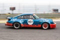 Porsche 911 3.0 RS on the asphalt in a classic cars race begins to brake before a curve Royalty Free Stock Photo