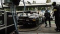 Porsche 911 RSR on jacks in the pits of Monza