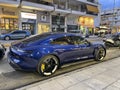 Porsche Taycan full electric supercar, parked in the center of Kalamata city, Greece