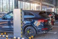 Porsche Turbo hybrid electric car charging with high power charging technology. Russia, Saint-Petersburg. 16 april 2019