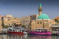 Port of Akko Acre with boats and mosque and the old city in the background, Israel. Royalty Free Stock Photo