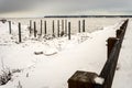 Port of Anchorage Small Boat Launch in the winter, covered with snow. It`s empty.