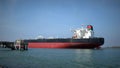 PORT ARANSAS, TX - 25 FEB 2023: Crude Oil Tanker and tugboats in time lapse